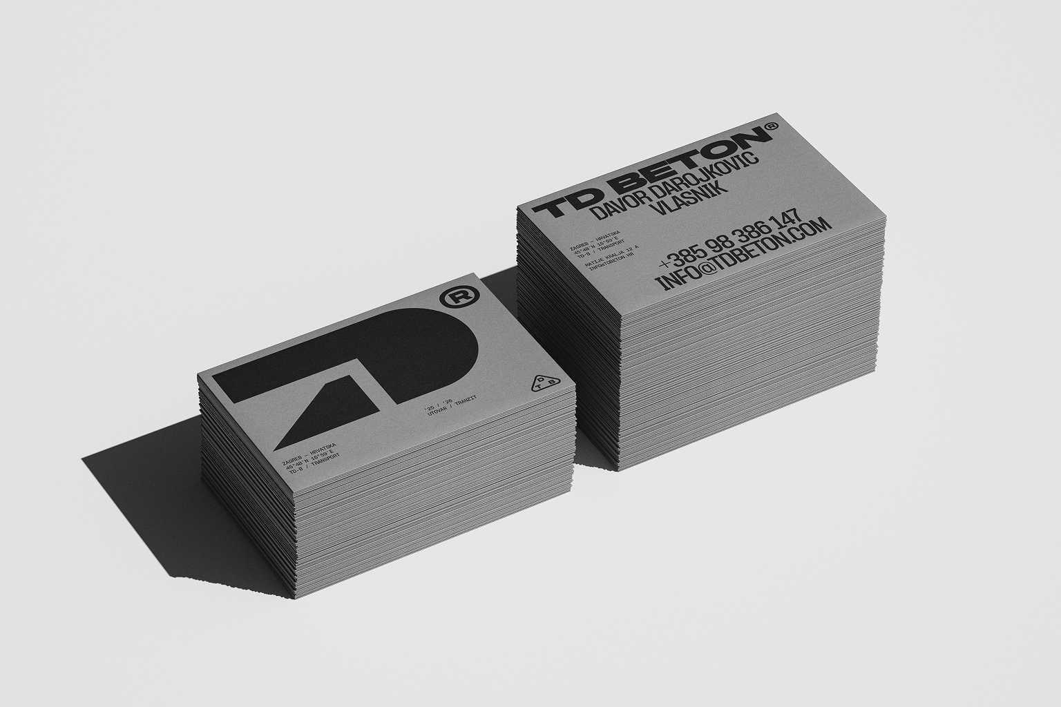 TD Beton brand identity on stacked monochrome business cards